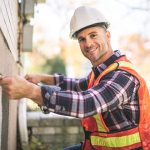 Contractor Working on the exterior of an HOA community